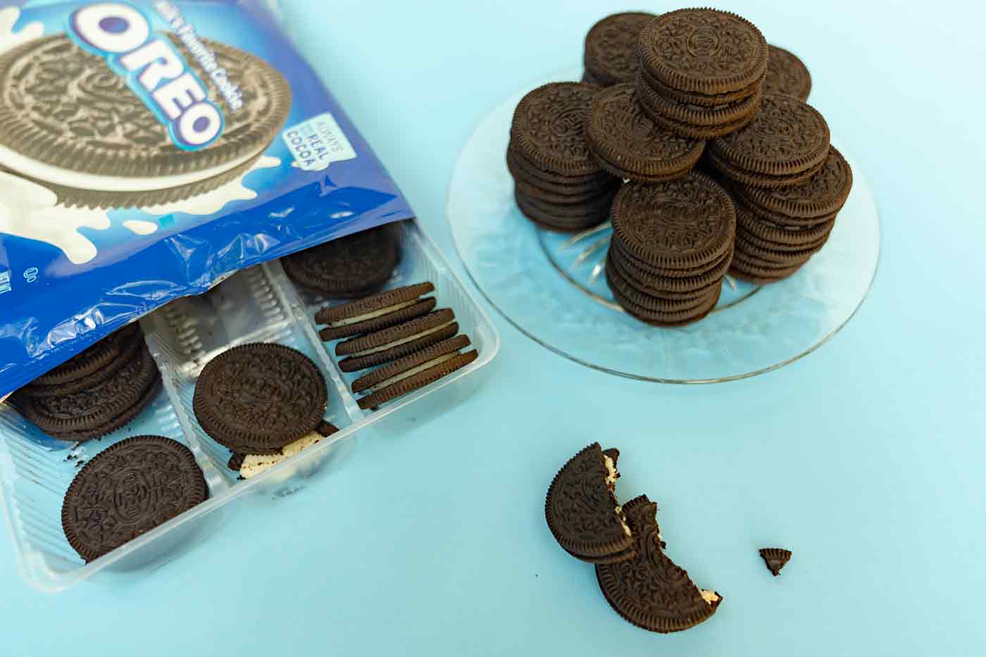 vegan Oreo cookies on a blue tabletop