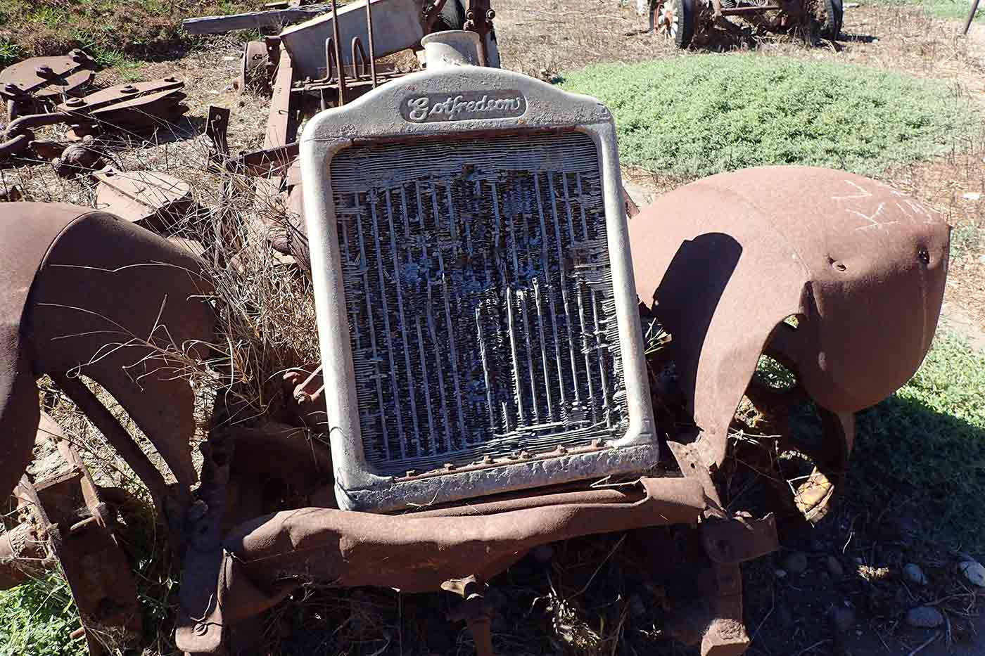 rusted out vintage farm equipment are a sign of the Santa Cruz Island ranching history