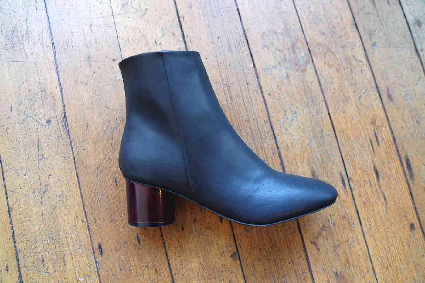 designer vegan black boot with a wooden heel