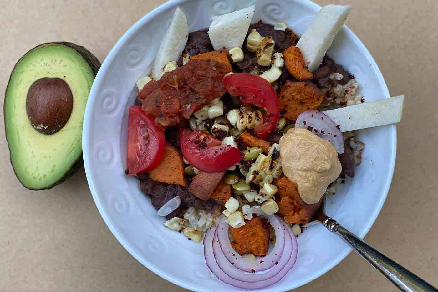 vegan burrito bean bowl with jicama red onion pub cheese brown rice grilled corn off the cob tomatoes and more