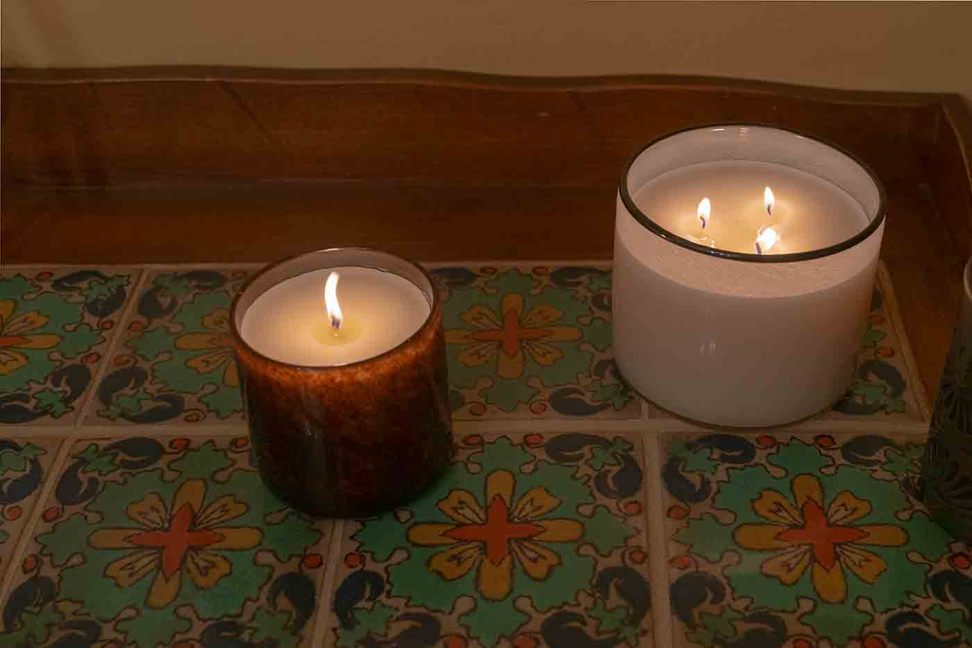 Redwood and Champaign LAFCO candles on a vintage tile sideboard