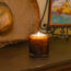 Redwood LAFCO candle pictured with a vintage Mexican hat and Spanish tile