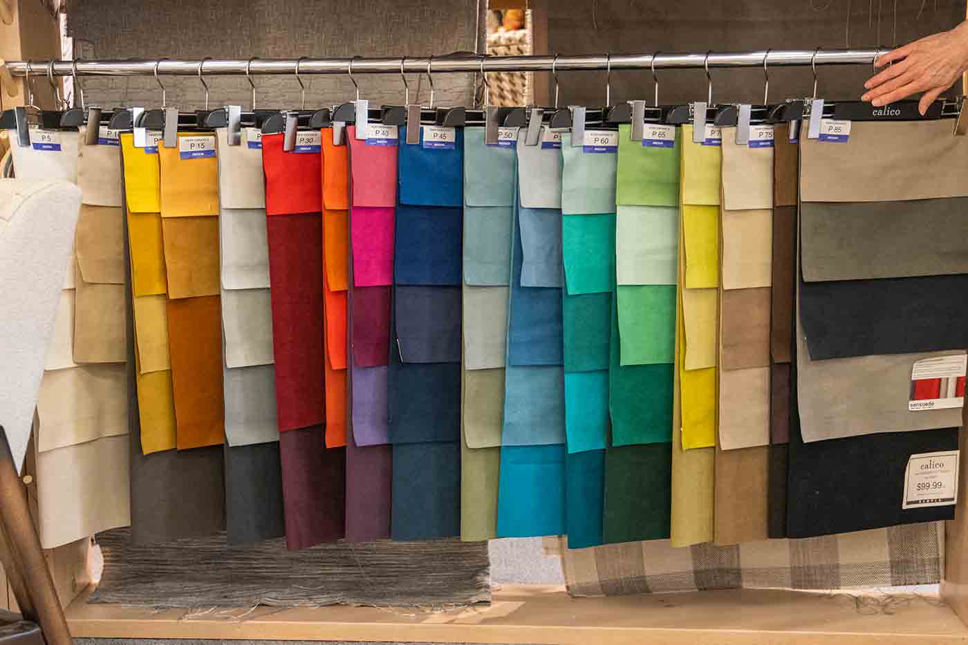 Sensuede faux suede swatches in a rainbow of colors plus neutrals at Calico Corners in Pasadena