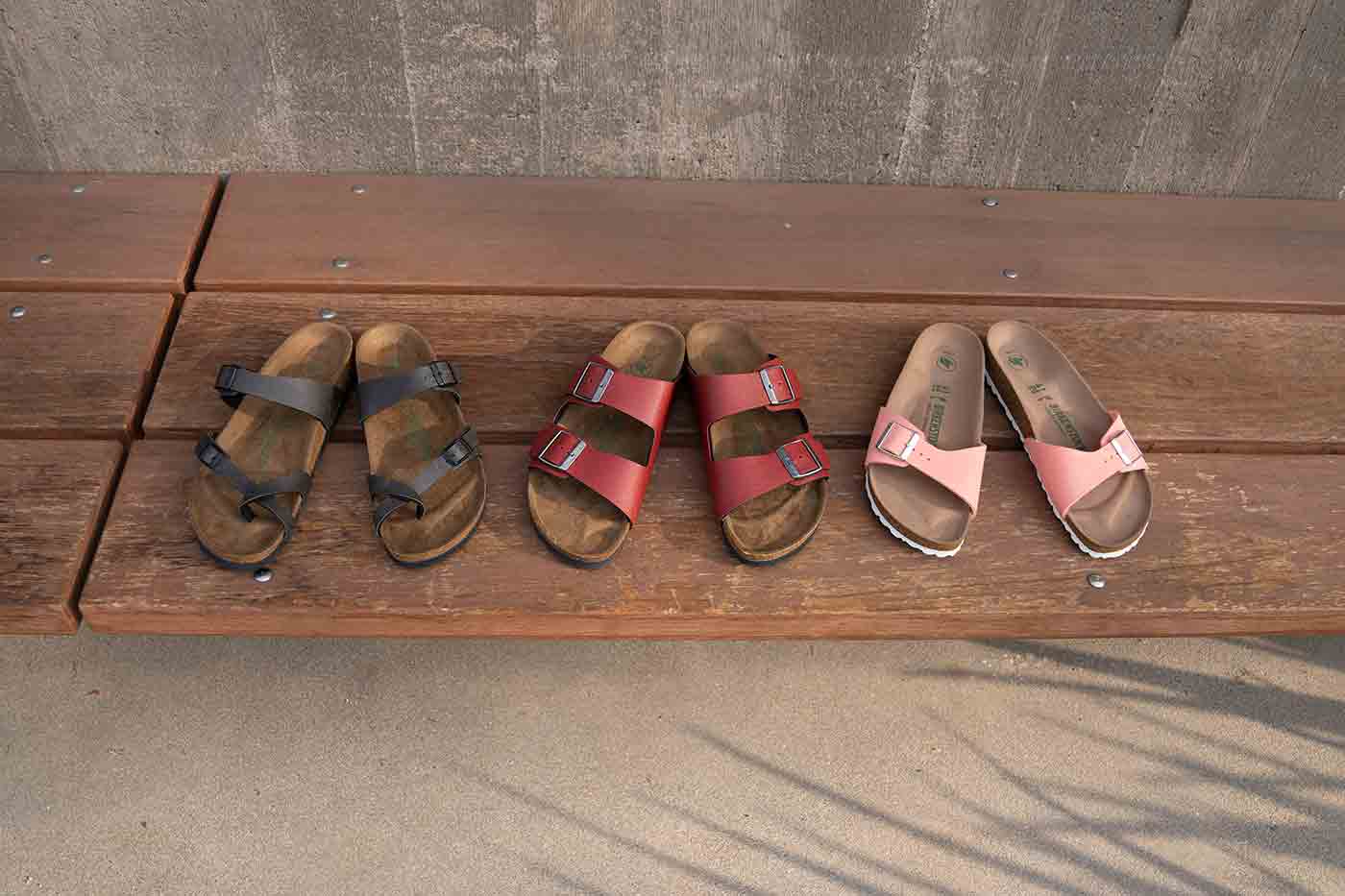 three of Birkenstocks most popular styles made of vegan leather