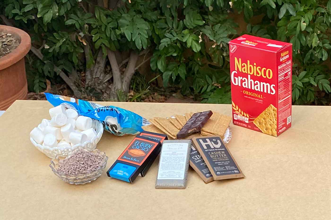 s'mores ingredients with chocolate graham crackers and marshmallows